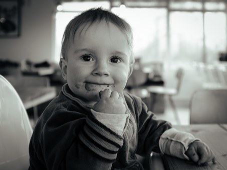 Child with food on face