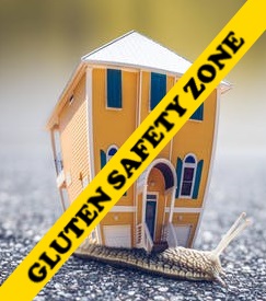 Picture of house with safety tape across it; gluten safety zone.