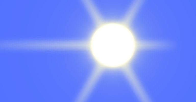 Sun light against blue sky